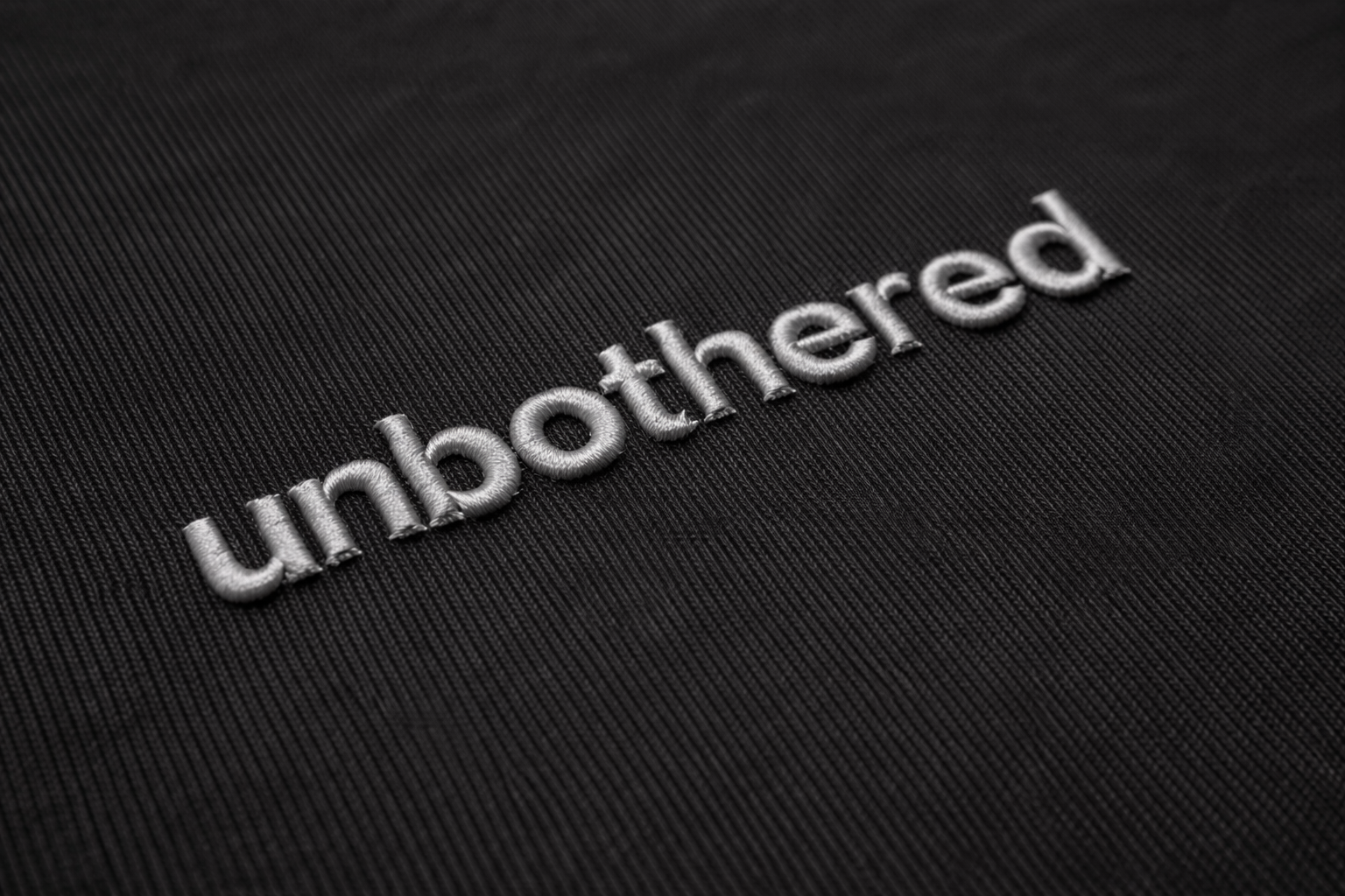 Unbothered Tee — Black / Grey Embroidery