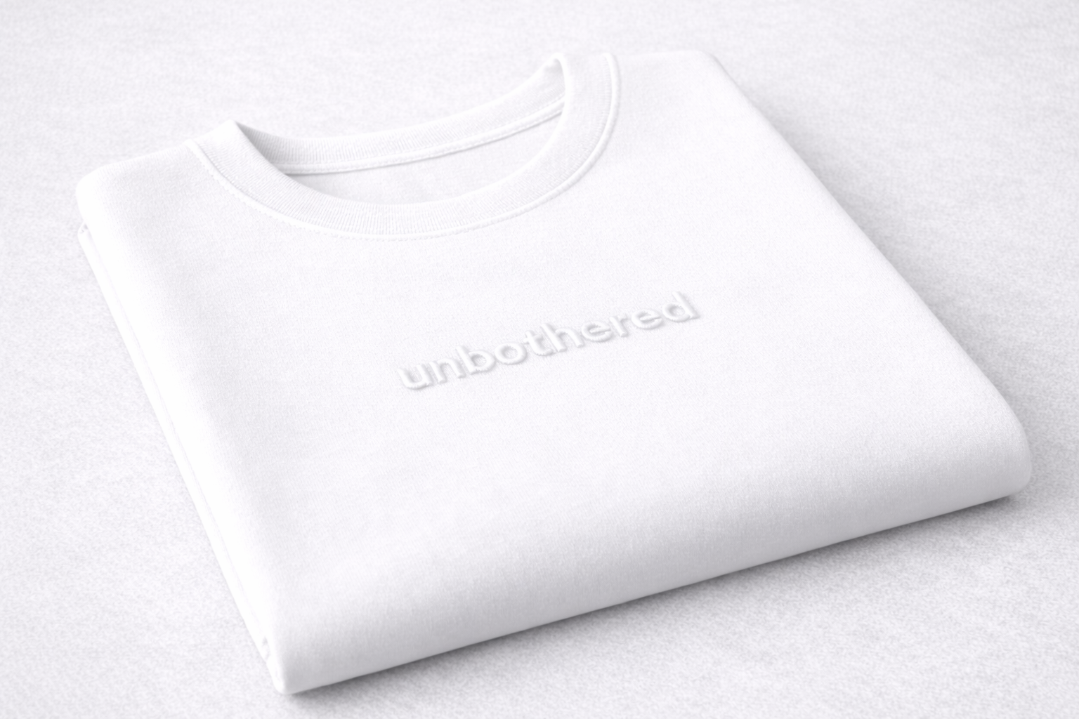 Unbothered Tee — White / White Embroidery